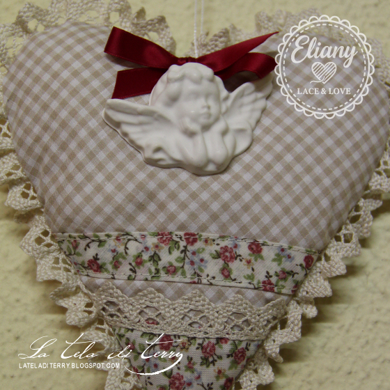 cuore decorativo con angelo in gesso