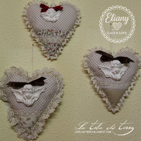 cuore decorativo con angelo in gesso