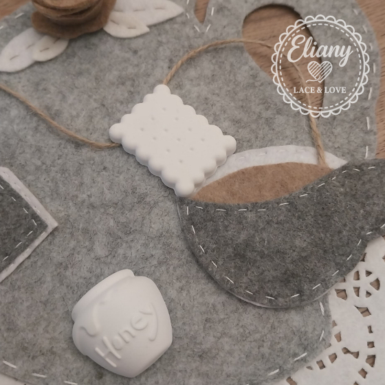 teiere con applicazioni feltro e gesso